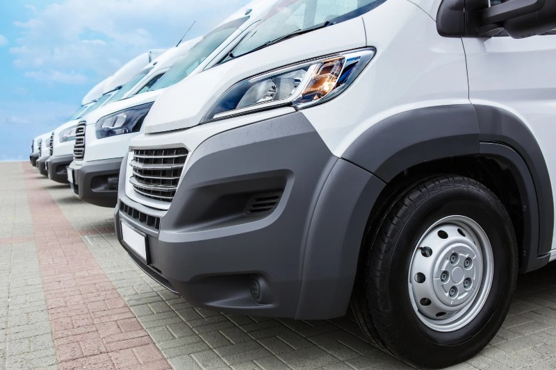 Fleet of delivery vans supporting reliable last mile delivery services for leading UK retailers